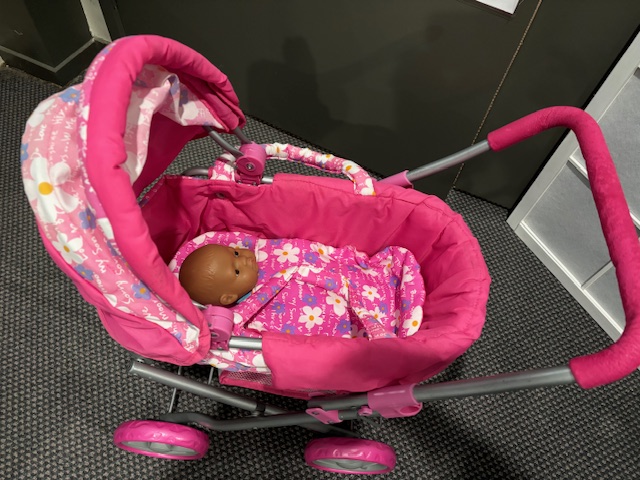 Pink Pram with Doll